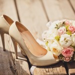 Wedding bouquet and bride shoes