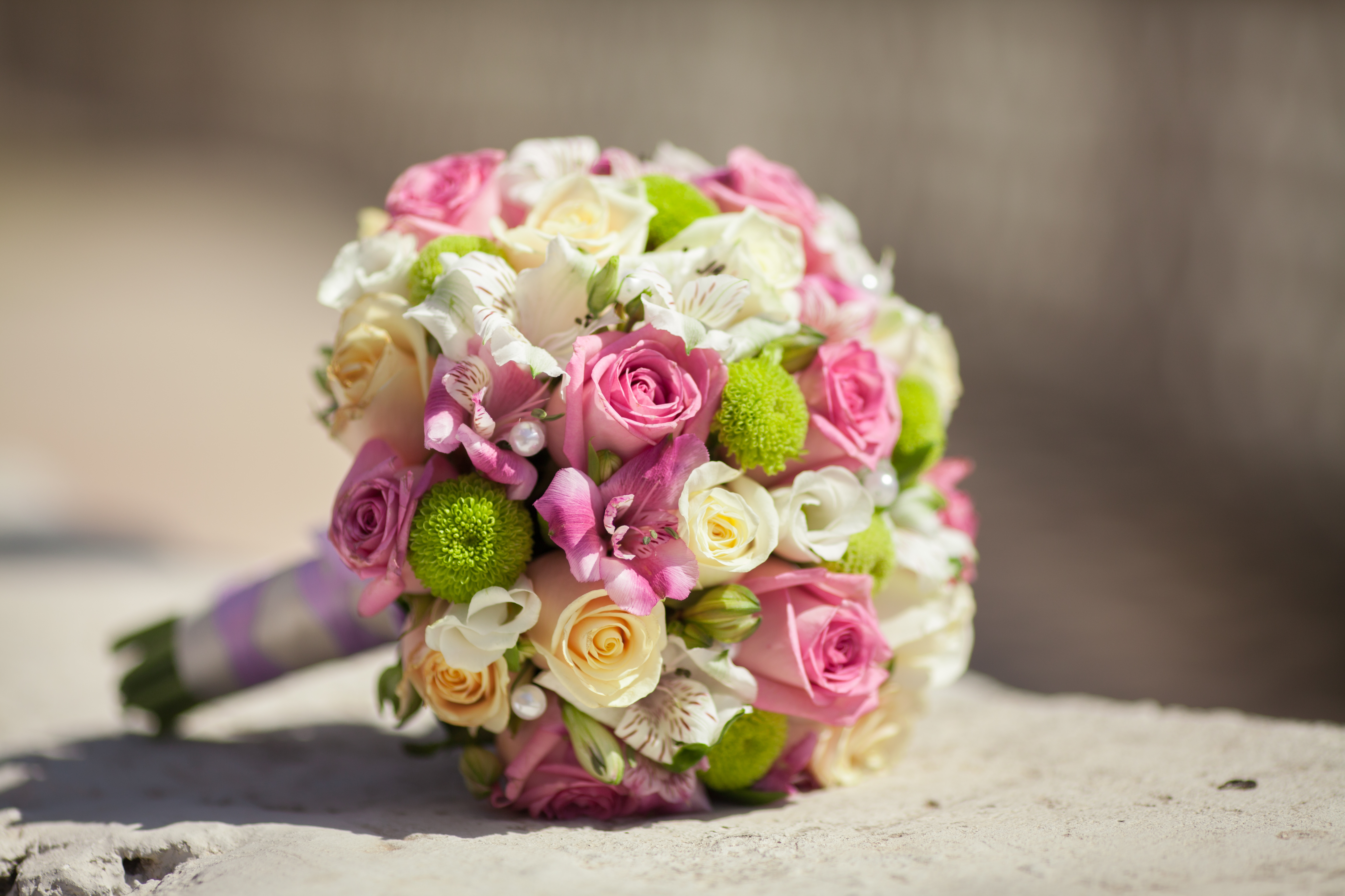 Beautiful wedding bouquet of fresh pink roses bridal flowers
